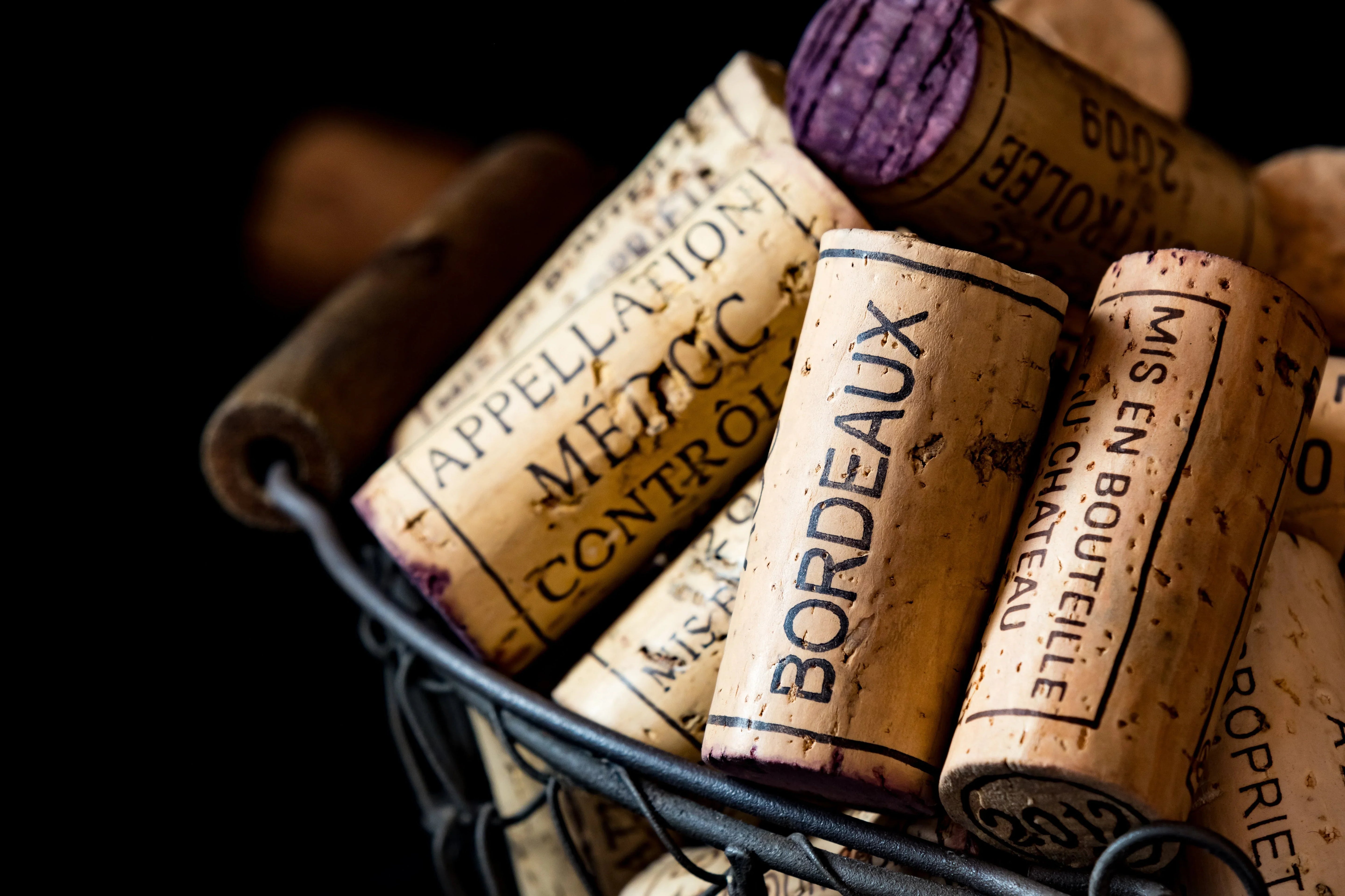 corked wine - basket of used wine corks